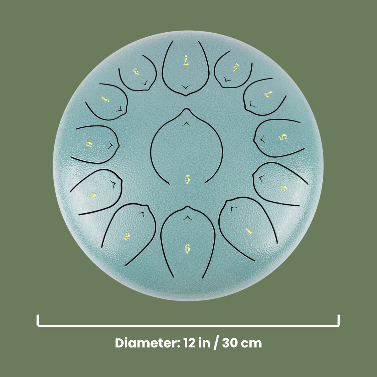 Metal tongue drum with drumhead design on a green background