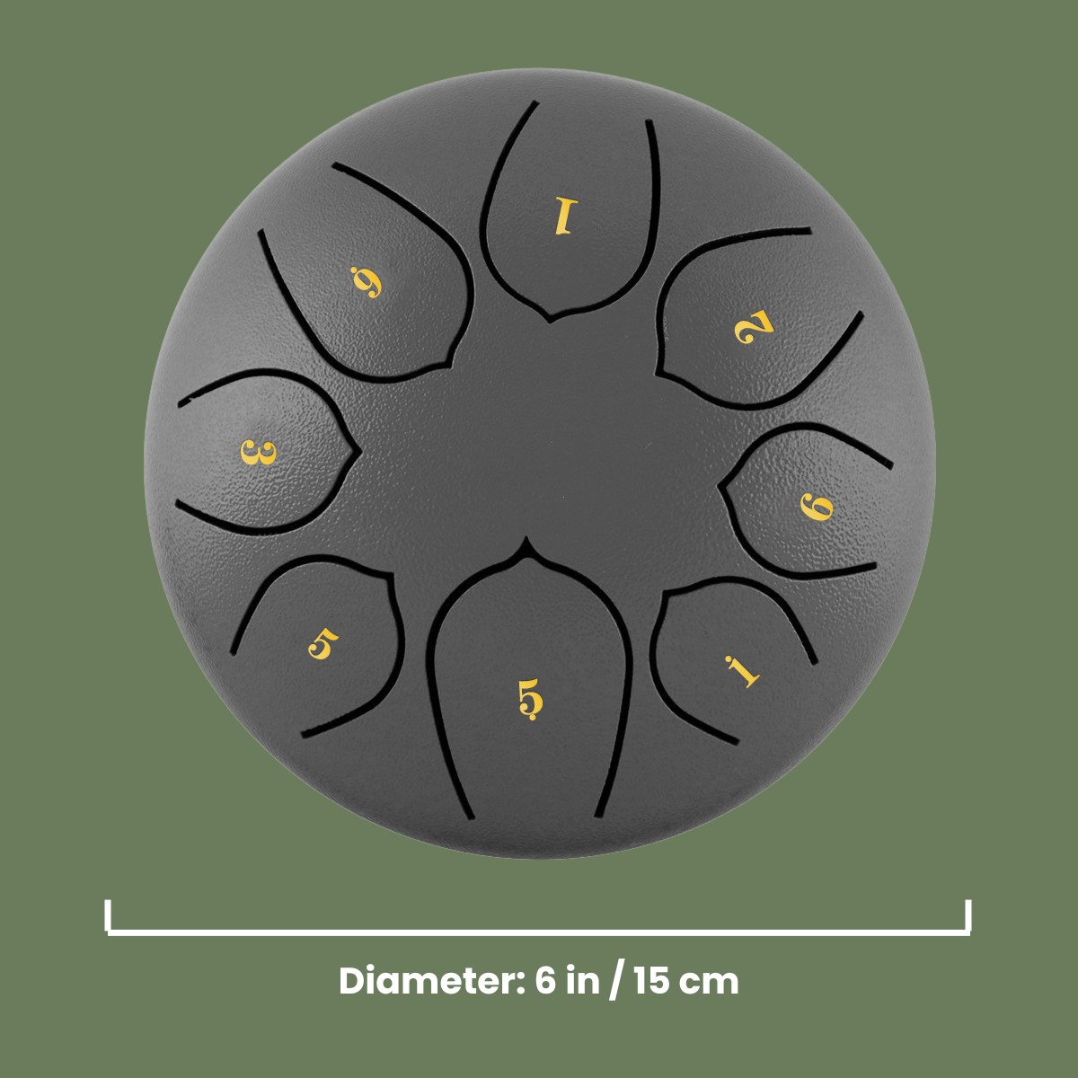 Black steel tongue drum with yellow numbering on a green background