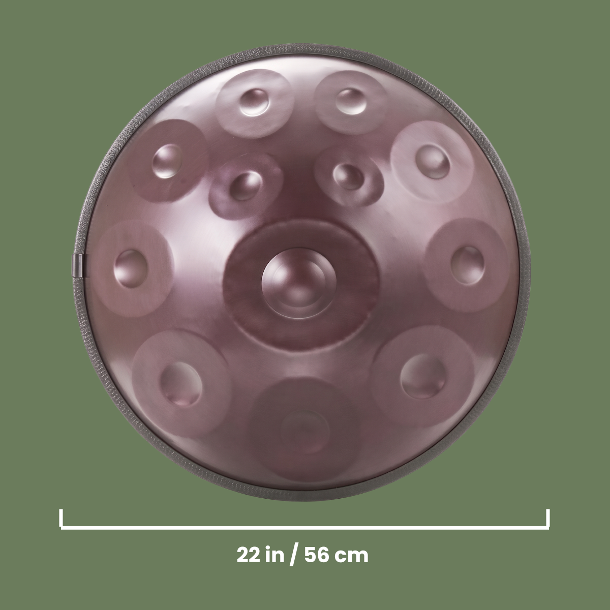 Detailed top view of the HarmoniqSound 432Hz handpan, showcasing the resonant red carbon steel construction.